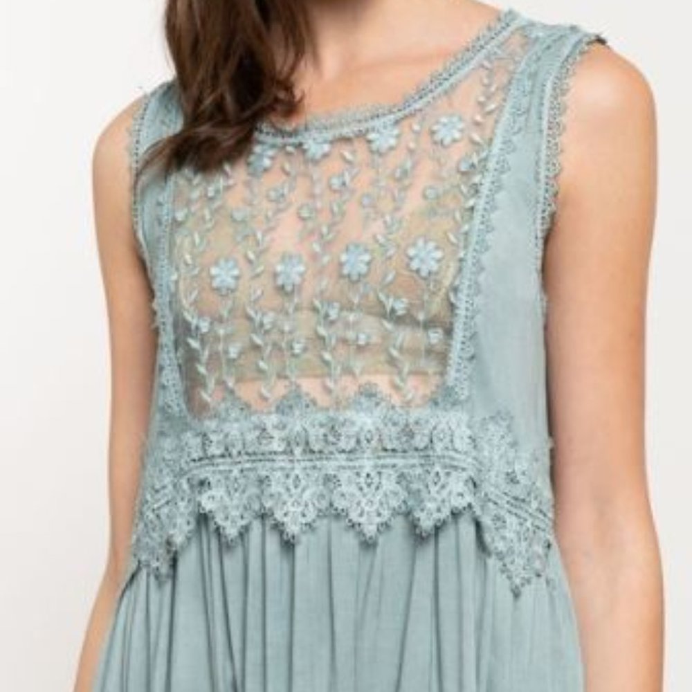 Peplum Style Sleeveless Top